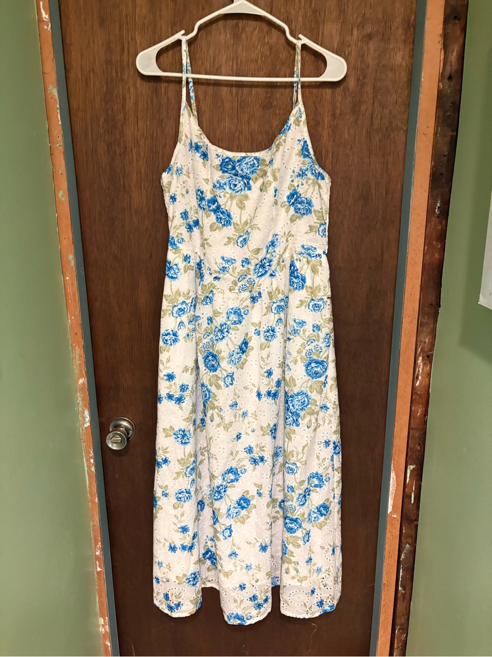 Sleeveless White Maxi Dress with Blue Floral Print